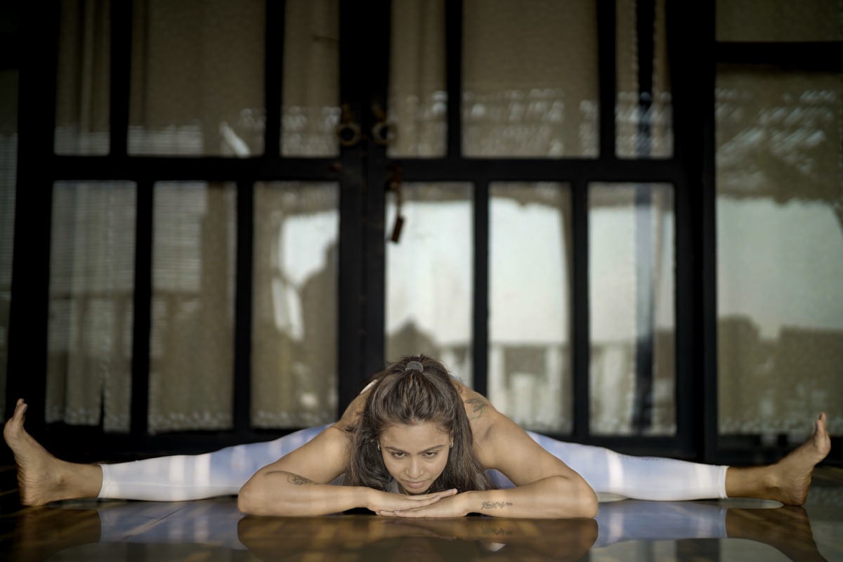 Yogaikyam RYT certified instructor guiding a therapeutic yoga alignment session